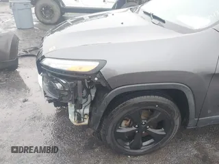 2016 Jeep Cherokee Sport with VIN 1C4PJMAB8GW318412, listed as a IAAI auction lot 41547774 with 150,078 mi miles. Bid and sale history available at carsss.com. Image 12.