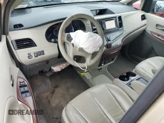 2012 Toyota Sienna XLE with VIN 5TDDK3DC1CS047265, listed as a Copart auction lot 58500275 with 203,548 mi miles and Salvage title. Bid and sale history available at DreamBid. Image 8.