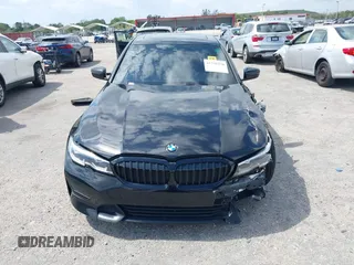 2021 BMW 3 Series 330i with VIN 3MW5R1J09M8B93600, listed as a IAAI auction lot 41735270 with 77,648 mi miles. Bid and sale history available at carsss.com. Image 12.