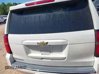 2015 Chevrolet Tahoe LTZ z VIN 1GNSKCKC7FR115444, wystawiony jako IAAI lot #42113903 z przebiegiem 162 383 mil mil oraz . Historia ofert i sprzedaży dostępna na DreamBid. Obrazek 16.