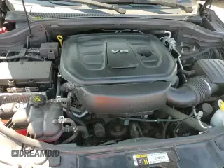 2018 Dodge Durango GT z VIN 1C4RDJDG4JC393476, wystawiony jako Copart lot #71658795 z przebiegiem 142 399 mil mil oraz Szkoda całkowita • Salvage title. Historia ofert i sprzedaży dostępna na DreamBid. Obrazek 14.