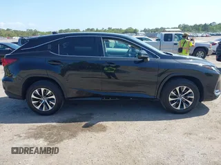 2021 Lexus RX with VIN 2T2AZMAA2MC196524, listed as a IAAI auction lot 42017362 with 80,922 mi miles. Bid and sale history available at carsss.com. Image 13.