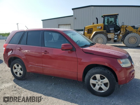 2012 Suzuki Grand Vitara Premium z VIN JS3TD0D60C4100503, wystawiony jako Copart lot #59050575 z przebiegiem 158 052 mil mil oraz Tytuł czysty. Historia ofert i sprzedaży dostępna na DreamBid. Obrazek 4.