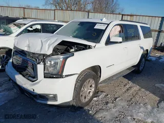 2017 GMC Yukon XL SLT with VIN 1GKS2GKC6HR117581, listed as a IAAI auction lot 41381380 with 119,184 mi miles. Bid and sale history available at carsss.com. Image 17.