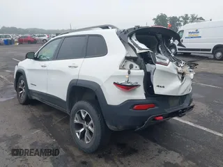 2016 Jeep Cherokee Trailhawk with VIN 1C4PJMBS4GW179121, listed as a IAAI auction lot 42516635 with 110,056 mi miles and . Bid and sale history available at DreamBid. Image 3.