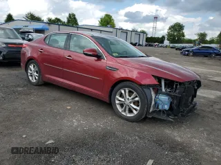 2013 Kia Optima EX z VIN 5XXGN4A72DG245695, wystawiony jako Copart lot #57225035 z przebiegiem 80 005 mil mil oraz Szkoda całkowita • Salvage title. Historia ofert i sprzedaży dostępna na DreamBid. Obrazek 4.