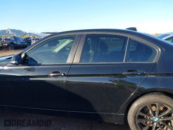 2016 BMW 3 Series 320i with VIN WBA8A9C55GK617241, listed as a IAAI auction lot 41781613 with 111,053 mi miles. Bid and sale history available at carsss.com. Image 14.