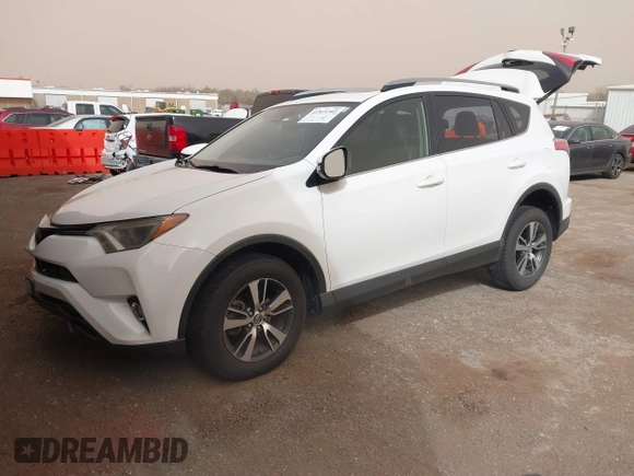 2018 Toyota RAV4 XLE with VIN JTMWFREV2JJ730568, listed as a IAAI auction lot 41814302 with 108,622 mi miles and . Bid and sale history available at DreamBid. Image 16.