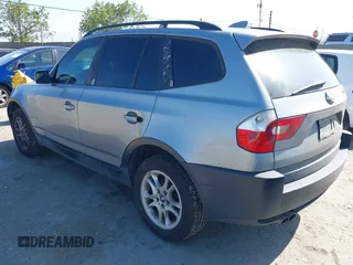 2004 BMW X3 2.5i with VIN WBXPA73414WC37026, listed as a IAAI auction lot 42142708 with 182,397 mi miles. Bid and sale history available at carsss.com. Image 3.