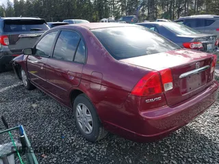 2003 Honda Civic LX with VIN 2HGES16553H558405, listed as a IAAI auction lot 41946031 with 127,145 mi miles. Bid and sale history available at carsss.com. Image 3.