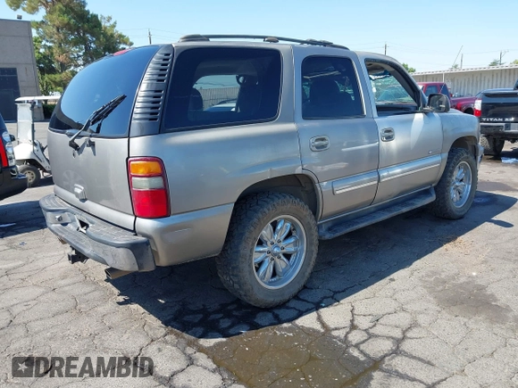 2001 Chevrolet Tahoe LS with VIN 1GNEC13T41J140922, listed as a IAAI auction lot 42709034 with 158,221 mi miles and . Bid and sale history available at DreamBid. Image 4.