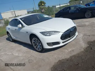 2016 Tesla Model S 70 kWh Battery with VIN 5YJSA1E16GF129997, listed as a IAAI auction lot 42108270 with 1 mi miles. Bid and sale history available at carsss.com. Image 1.