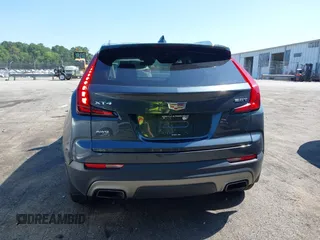 2019 Cadillac XT4 AWD Premium Luxury with VIN 1GYFZDR40KF129461, listed as a IAAI auction lot 42531671 with 60,731 mi miles and . Bid and sale history available at DreamBid. Image 16.