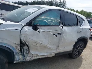 2018 Mazda CX-5 Grand Touring with VIN JM3KFBDM1J0309260, listed as a IAAI auction lot 42247237 with Not Provided miles and . Bid and sale history available at DreamBid. Image 14.