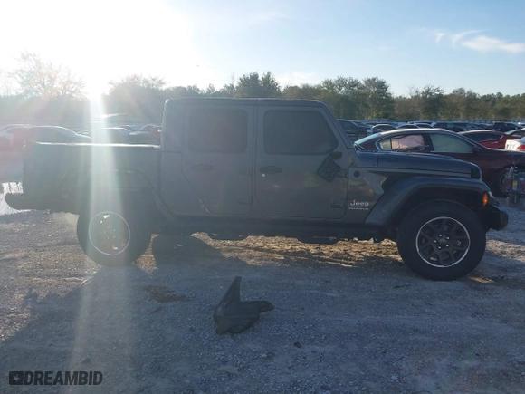 2023 Jeep Gladiator Overland with VIN 1C6HJTFG1PL546604, listed as a IAAI auction lot 41599632 with 23,108 mi miles. Bid and sale history available at carsss.com. Image 14.