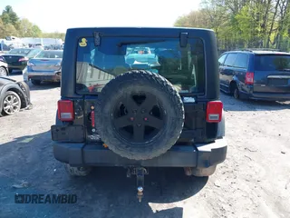 2012 Jeep Wrangler Unlimited Sport z VIN 1C4BJWDG1CL220511, wystawiony jako IAAI lot #42227037 z przebiegiem 157 914 mil mil oraz . Historia ofert i sprzedaży dostępna na DreamBid. Obrazek 16.