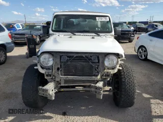 2018 Jeep Wrangler Unlimited Sport with VIN 1C4HJXDN0JW298109, listed as a Copart auction lot 52991795 with 94,445 mi miles and Salvage title. Bid and sale history available at DreamBid. Image 5.