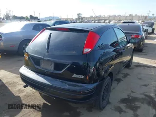 2007 Ford Focus S with VIN 1FAFP31N87W198745, listed as a IAAI auction lot 41928232 with 117,667 mi miles and . Bid and sale history available at carsss.com. Image 4.