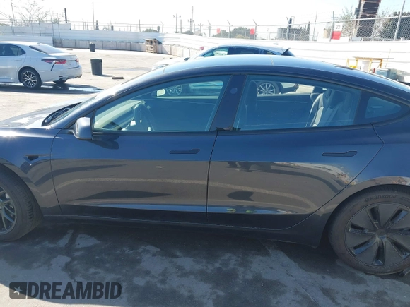 2024 Tesla Model 3 with VIN 5YJ3E1EA7RF717855, listed as a IAAI auction lot 41838814 with 8,750 mi miles and . Bid and sale history available at DreamBid. Image 14.