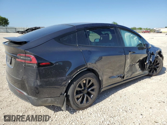 2023 Tesla Model X with VIN 7SAXCDE5XPF422163, listed as a Copart auction lot 52573185 with Not Provided miles and Salvage Title. Bid and sale history available at DreamBid. Image 3.