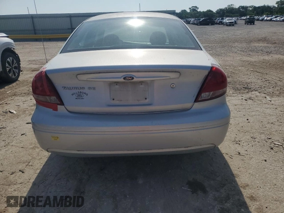 2004 Ford Taurus SE with VIN 1FAFP53U04G133586, listed as a Copart auction lot 59972925 with 228,938 mi miles and Salvage title. Bid and sale history available at DreamBid. Image 6.