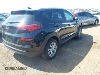 2021 Hyundai Tucson Value with VIN KM8J33A45MU391039, listed as a IAAI auction lot 42086825 with 16,910 mi miles. Bid and sale history available at carsss.com. Image 4.