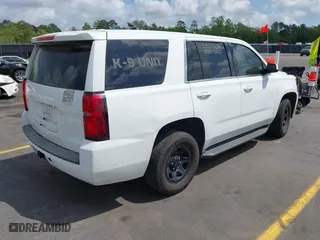 2016 Chevrolet Tahoe Commercial with VIN 1GNLCDEC5GR423300, listed as a IAAI auction lot 41967399 with 147,429 mi miles. Bid and sale history available at carsss.com. Image 4.