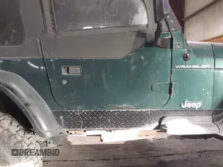 1999 Jeep Wrangler SE with VIN 1J4FY29P4XP457291, listed as a IAAI auction lot 41549758 with 133,362 mi miles and . Bid and sale history available at DreamBid. Image 6.