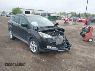 2015 Ford Escape SE with VIN 1FMCU9GX5FUB99018, listed as a IAAI auction lot 42250840 with 126,850 mi miles and . Bid and sale history available at DreamBid. Image 1.