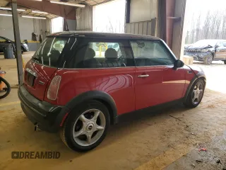 2004 MINI Hardtop with VIN WMWRC33474TJ58626, listed as a Copart auction lot 49226175 with 116,115 mi miles and Salvage Title. Bid and sale history available at DreamBid. Image 3.