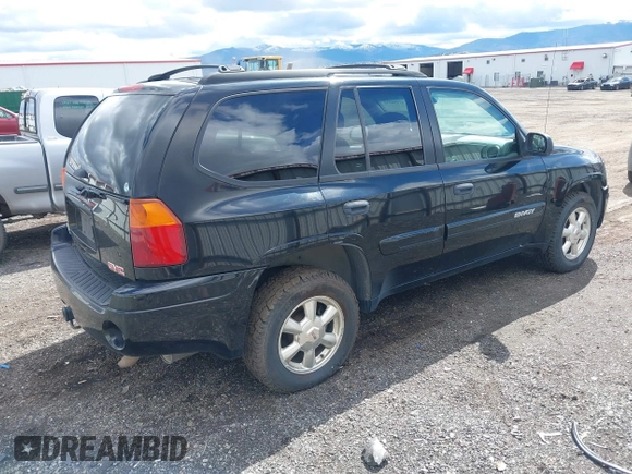 2005 GMC Envoy SLE with VIN 1GKDT13S552212811, listed as a IAAI auction lot 41996953 with 147,896 mi miles. Bid and sale history available at carsss.com. Image 4.