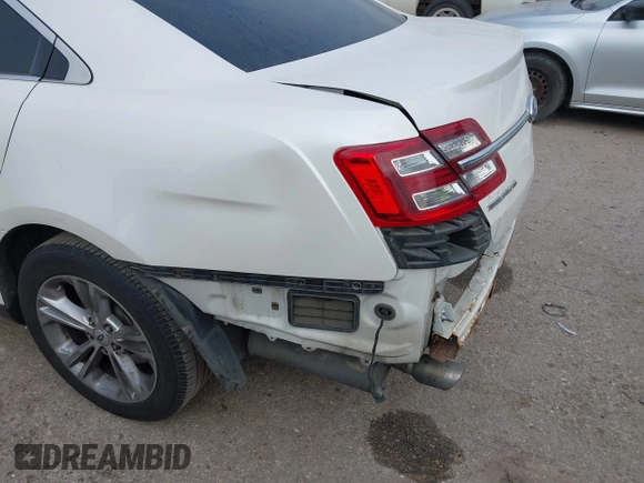 2013 Ford Taurus SEL with VIN 1FAHP2E87DG111530, listed as a IAAI auction lot 41322957 with 183,103 mi miles. Bid and sale history available at carsss.com. Image 13.