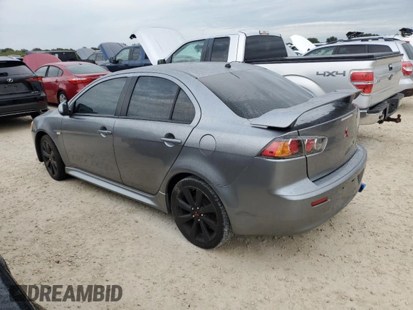 2013 Mitsubishi Lancer GT with VIN JA32U8FW9DU010787, listed as a Copart auction lot 73481664 with 142,188 mi miles and Salvage Title. Bid and sale history available at carsss.com. Image 2.