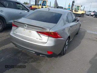 2020 Lexus IS with VIN JTHGA1D20L5105897, listed as a IAAI auction lot 41926240 with 72,818 mi miles. Bid and sale history available at carsss.com. Image 4.