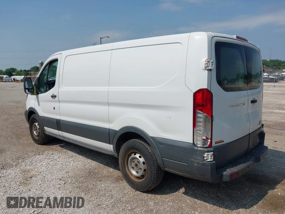 2015 Ford Transit Cargo z VIN 1FTNE1ZM4FKB15801, wystawiony jako IAAI lot #42674219 z przebiegiem 228 634 mil mil oraz . Historia ofert i sprzedaży dostępna na DreamBid. Obrazek 3.