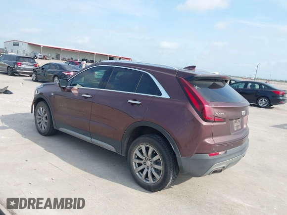 2023 Cadillac XT4 FWD Premium Luxury with VIN 1GYFZCR47PF106017, listed as a IAAI auction lot 42283401 with 40,734 mi miles and . Bid and sale history available at DreamBid. Image 3.