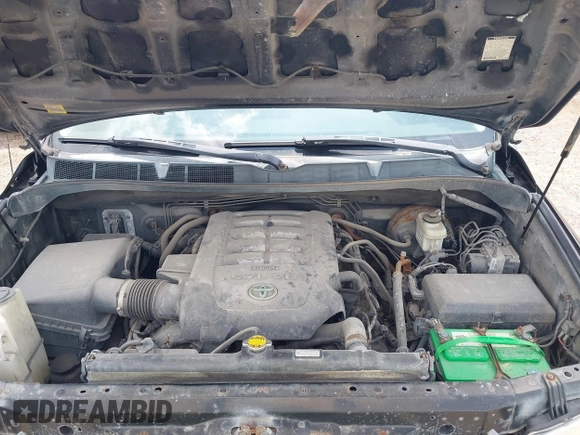 2013 Toyota Tundra z VIN 5TFDW5F13DX302067, wystawiony jako IAAI lot #42461336 z przebiegiem 124 876 mil mil oraz . Historia ofert i sprzedaży dostępna na DreamBid. Obrazek 10.