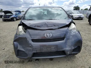 2012 Scion iQ z VIN JTNJJXB06CJ009187, wystawiony jako Copart lot #56563665 z przebiegiem 105 014 mil mil oraz Szkoda całkowita • Salvage title. Historia ofert i sprzedaży dostępna na DreamBid. Obrazek 5.