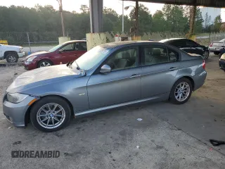 2010 BMW 3 Series 328i with VIN WBAPH7G50ANM52307, listed as a Copart auction lot 74597724 with 114,045 mi miles and Salvage Title. Bid and sale history available at carsss.com. Image 1.