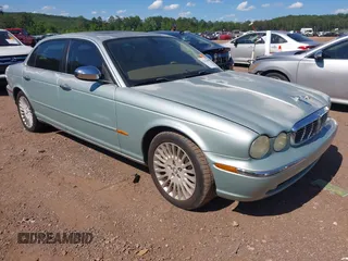 2005 Jaguar XJ Vanden Plas z VIN SAJWA82C15SG45138, wystawiony jako IAAI lot #42333899 z przebiegiem 157 226 mil mil oraz . Historia ofert i sprzedaży dostępna na DreamBid. Obrazek 1.