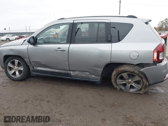 2016 Jeep Compass High Altitude Edition with VIN 1C4NJCEA2GD718173, listed as a IAAI auction lot 40930567 with 58,048 mi miles. Bid and sale history available at carsss.com. Image 6.