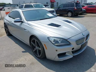 2012 BMW 6 Series 650i z VIN WBALX3C55CDV77683, wystawiony jako IAAI lot #42396547 z przebiegiem 137 415 mil mil oraz . Historia ofert i sprzedaży dostępna na DreamBid. Obrazek 1.