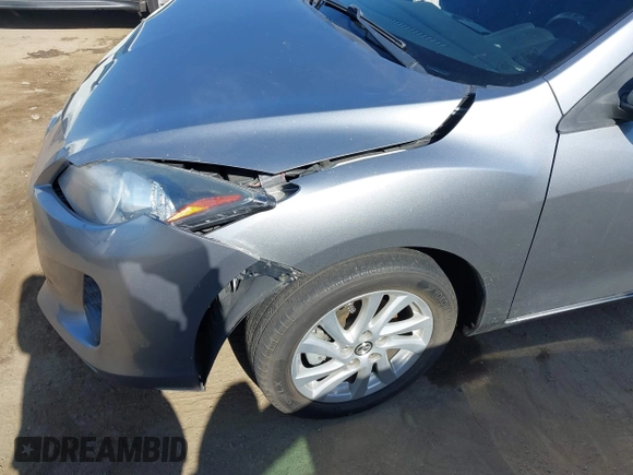 2013 Mazda 3 i Grand Touring z VIN JM1BL1WP0D1736124, wystawiony jako IAAI lot #42271018 z przebiegiem 124 478 mil mil oraz . Historia ofert i sprzedaży dostępna na DreamBid. Obrazek 18.