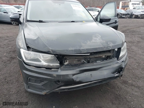 2018 Volkswagen Tiguan S with VIN 3VV1B7AX9JM091210, listed as a IAAI auction lot 41683380 with 63,627 mi miles. Bid and sale history available at carsss.com. Image 6.