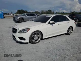 2014 Mercedes-Benz E 350 Luxury with VIN WDDHF8JB5EA810473, listed as a Copart auction lot 64613675 with 124,397 mi miles and Clean title. Bid and sale history available at DreamBid. Image 1.