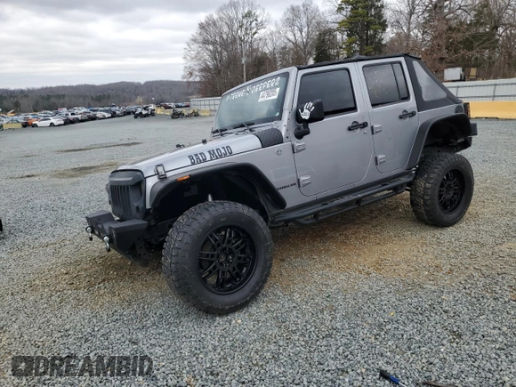 2014 Jeep Wrangler Unlimited Rubicon with VIN 1C4BJWFG7EL197252, listed as a Copart auction lot 44798205 with 115,778 mi miles and Salvage Title. Bid and sale history available at carsss.com. Image 1.