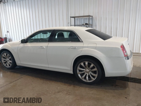 2014 Chrysler 300 z VIN 2C3CCAAG8EH381206, wystawiony jako IAAI lot #42279538 z przebiegiem 136 796 mil mil oraz . Historia ofert i sprzedaży dostępna na DreamBid. Obrazek 13.