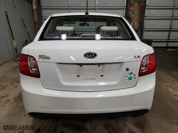 2010 Kia Rio LX with VIN KNADH4A37A6665273, listed as a Copart auction lot 51220435 with 103,596 mi miles and Salvage Title. Bid and sale history available at carsss.com. Image 6.