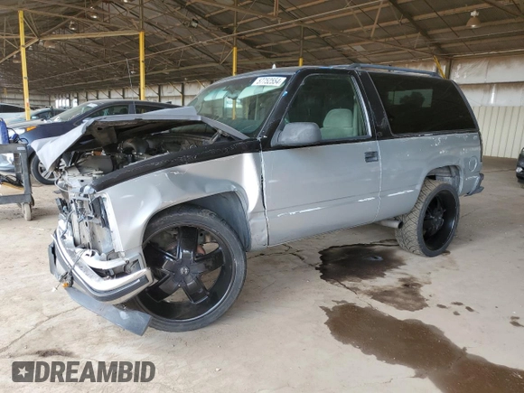 1998 Chevrolet Tahoe with VIN 3GNEC18R3WG122904, listed as a Copart auction lot 57752554 with 229,646 mi miles and Salvage title. Bid and sale history available at DreamBid. Image 1.