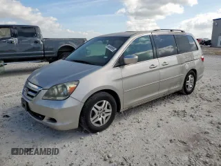2005 Honda Odyssey EX with VIN 5FNRL38495B423921, listed as a Copart auction lot 66090995 with 157,076 mi miles and Clean title. Bid and sale history available at DreamBid. Image 1.